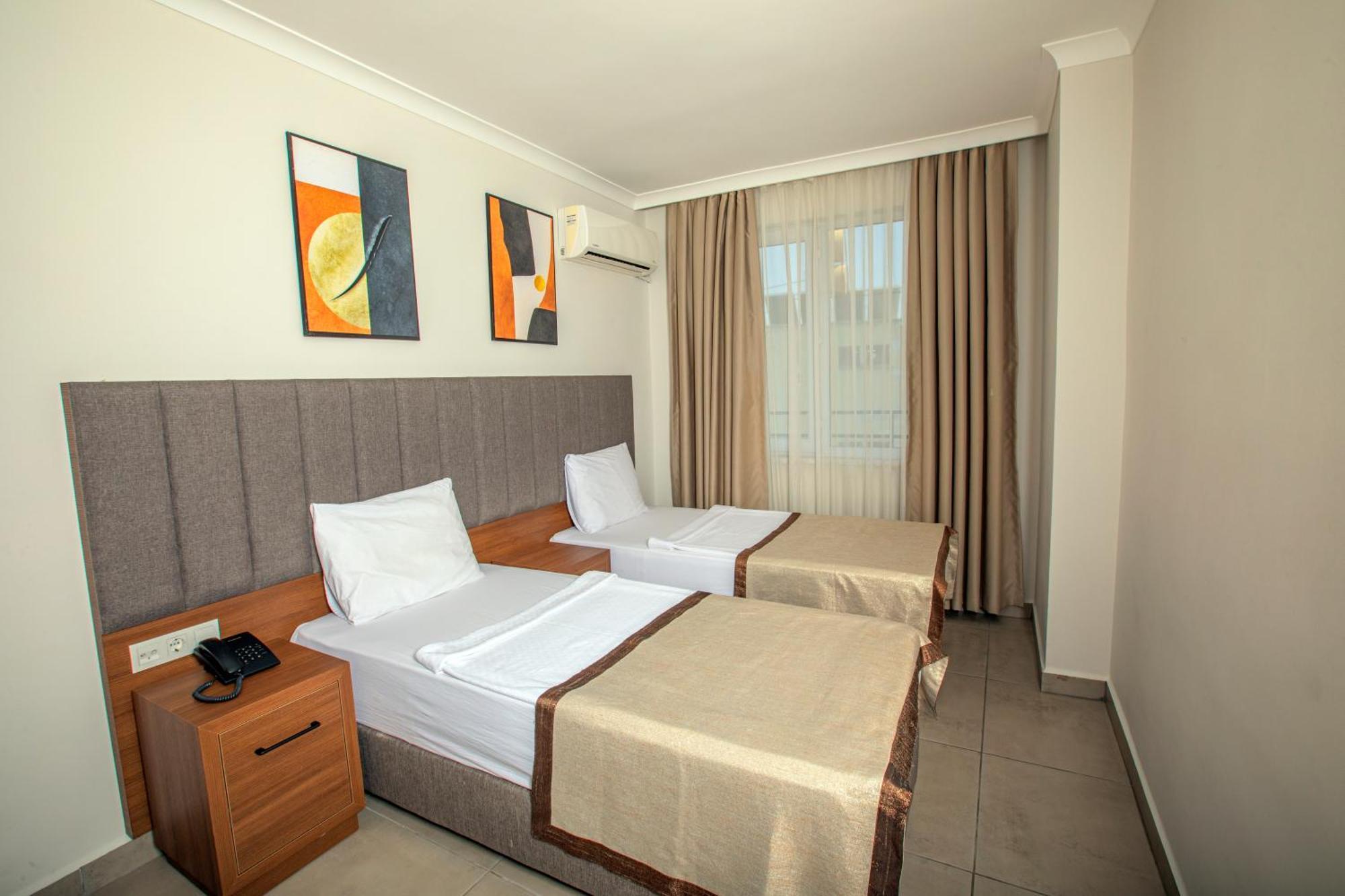 เพอร์เล อพาร์ท โฮเทล Hotel อลันยา ภายนอก รูปภาพ